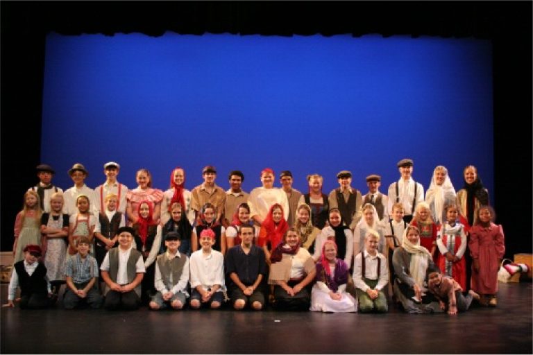 Full cast of I Am Dreaming of America, a play about the journey to Ellis Island in 1908