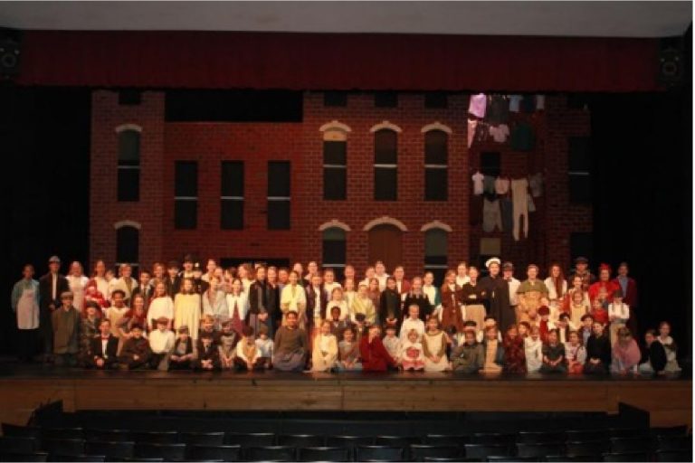 Full cast of Fiona's Gift, a play set during Christmas on the Lower East Side in 1913